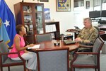 Keisha High sits with Air Force Brig. Gen. Albert Miller