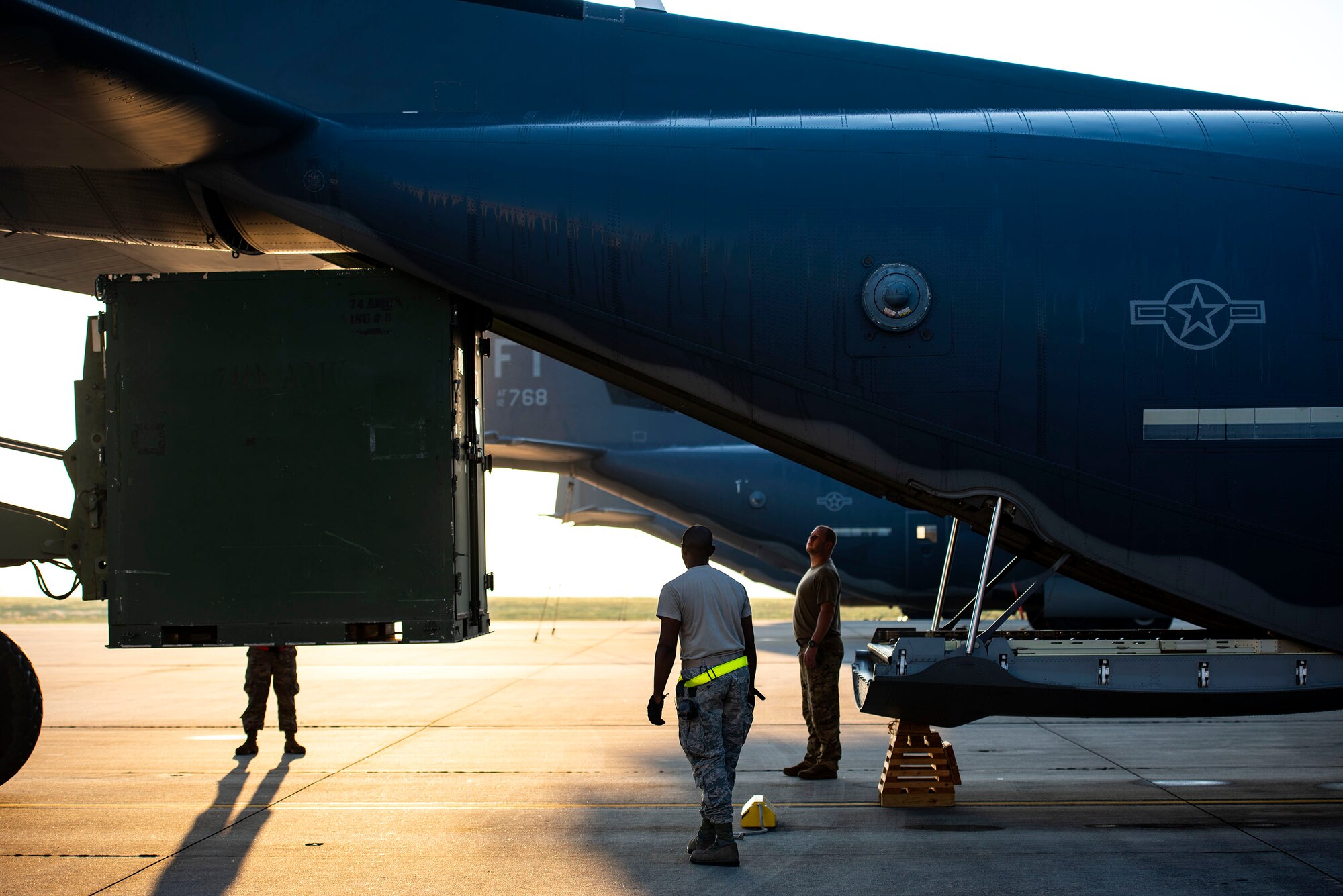 Airmen from the 71st Rescue Squadron load equipment onto an HC-130J Combat King II Aug. 30, 2019, at Moody Air Force Base (AFB), Ga. The aircraft was used to transport personnel and equipment to Little Rock AFB, Ark. in support of Hurricane Dorian aircraft relocation efforts. (U.S. Air Force photo by Senior Airman Erick Requadt)