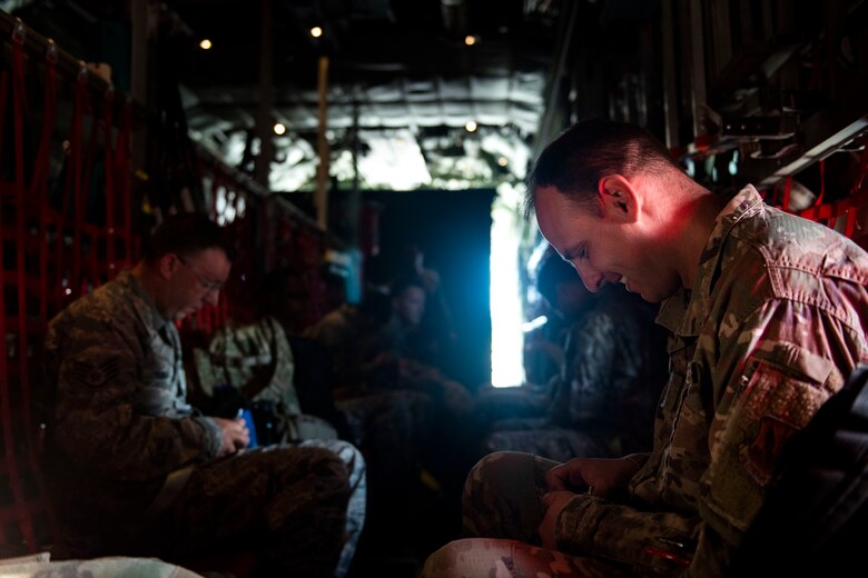 Airmen from the 74th Aircraft Maintenance Unit secure themselves into an HC-130J Combat King II Aug. 30, 2019, at Moody Air Force Base (AFB), Ga. Airmen from the 23d Maintenance Group went to support the 23d Fighter Group assets that were relocated to Little Rock AFB, Ark., in anticipation of Hurricane Dorian. (U.S. Air Force photo by Senior Airman Erick Requadt)