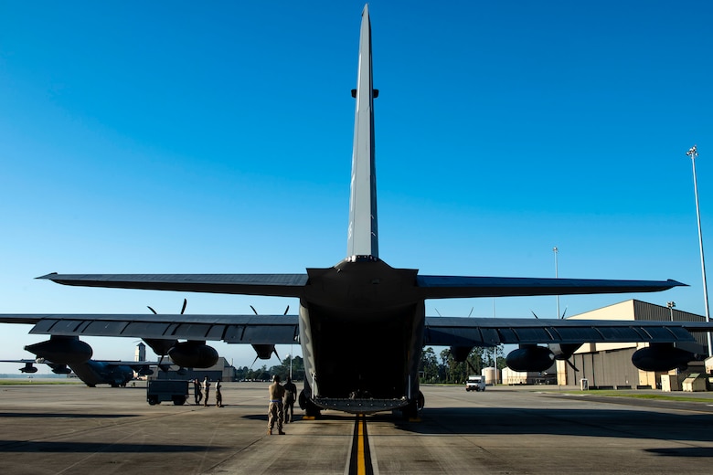 Airmen from the 71st Aircraft Maintenance Unit prepare an HC-130J Combat King II for takeoff Aug. 30, 2019, at Moody Air Force Base (AFB), Ga. The aircraft was used to transport personnel and equipment to Little Rock AFB, Ark. in support of Hurricane Dorian aircraft relocation efforts. (U.S. Air Force photo by Senior Airman Erick Requadt)