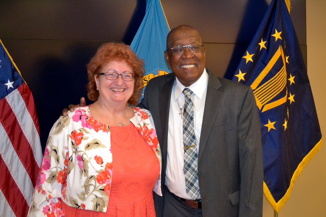 Linda Gruber, left, and Stanley Williams, right, retired from the Construction and Equipment supply chain after 38 and 32 years of service respectively at the Defense Logistics Agency Troop Support. Their milestones were celebrated during a civilian retirement ceremony on Aug. 29, 2019 in Philadelphia.