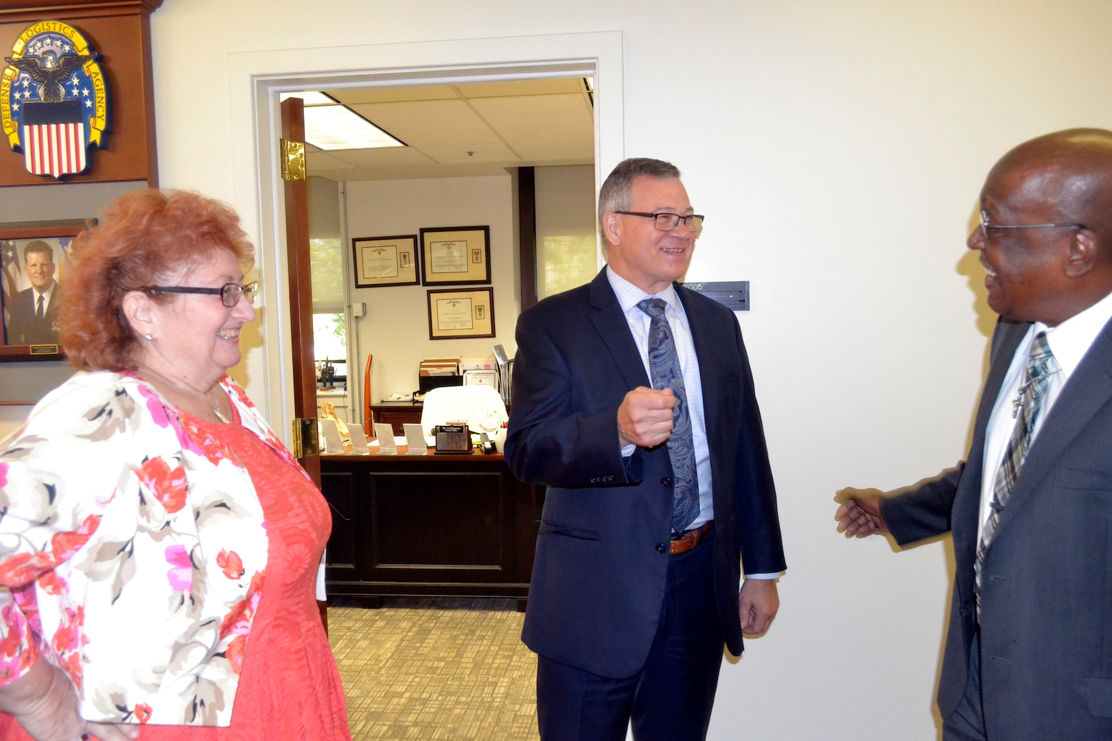 Linda Gruber, left, with Defense Logistics Agency Troop Support Deputy Commander Richard Ellis, center, and Stanley Williams, right, before the civilian retirement ceremony for Gruber and Ellis on Aug. 29, 2019 in Philadelphia. Gruber and Williams retired from the Construction and Equipment supply chain after 38 and 32 years of service respectively at DLA Troop Support.