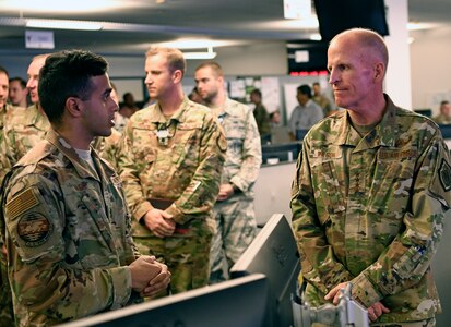 First Lt. Partha Naidu, 33rd Network Warfare Squadron officer in charge of innovation, briefs Gen. Stephen Wilson, Vice Chief of Staff of the Air Force, on the 12 N 12 initiative at Joint Base San Antonio-Lackland Aug. 28. The initiative aims to modernize the Air Force Cyberspace Security and Defense mission area to a state-of-the-art system built on simplicity, interoperability, automation and agility.