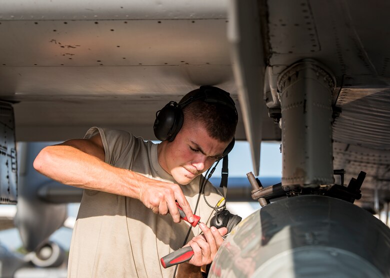 Airman 1st Class Colin Glennen, 74th Aircraft Maintenance Unit crew chief, screws in a panel of an A-10C Thunderbolt II, Aug. 30, 2019, at Moody Air Force Base, Ga. Moody’s A-10s were relocated to Little Rock AFB, Ark. in anticipation of Hurricane Dorian. (U.S. Air Force photo by Airman 1st Class Eugene Oliver)