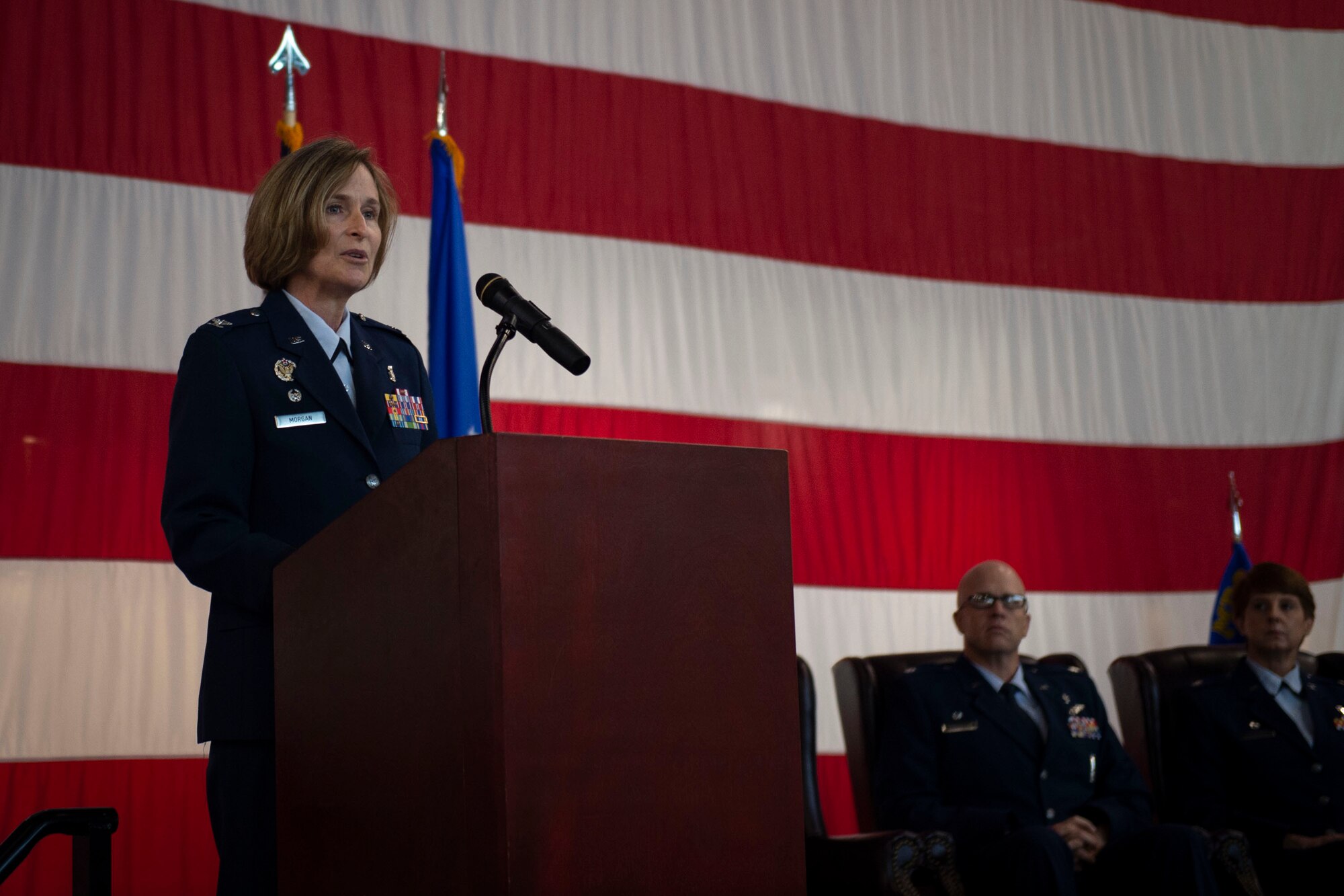 Col. Tiffany Morgan, 23d Medical Group commander, speaks during a redesignation ceremony, Aug. 30, 2019, at Moody Air Force Base, Ga. The redesignation ceremony marked the transition of both the 23d Aerospace Medicine Squadron to the 23d Operational Medical Readiness Squadron and the 23d Medical Operations Squadron to the 23d Healthcare Operations Squadron. The redesignation was part of an Air Force-wide medical transformation directive to provide more effective and efficient ways to care for Team Moody Airman and restore squadron readiness to execute the mission.  (U.S. Air Force photo by Airman Azaria E. Foster)