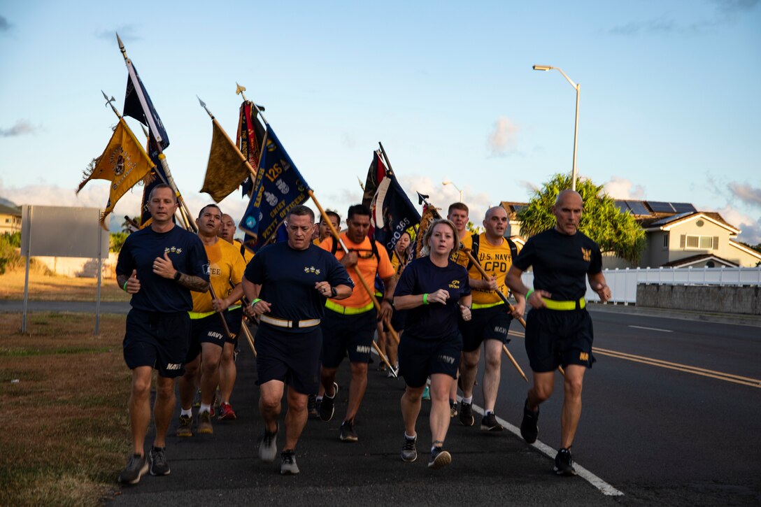 U.S. Navy Sailors around Oahu participate in a motivational run during the annual Fleet Marine Force Challenge, Marine Corps Base Hawaii, Aug. 29, 2019. The event primarily focused on teamwork while also helping build comradery and leadership for the chief selectees. (U.S. Marine Corps photo by Pfc. Jose Angeles)