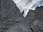 A team from Inyo County Search and Rescue is inserted near Iceberg Lake on Mount Whitney, Aug. 25, 2019, by a U.S. Army CH-47F Chinook helicopter assigned to B Company, 1st Battalion, 126th Aviation Regiment, California Army National Guard, for a high-altitude hoist rescue of an injured hiker about 700 feet below the mountain's peak. Cal Guard assists local, state and federal agencies during search and rescue missions and domestic disaster response efforts.