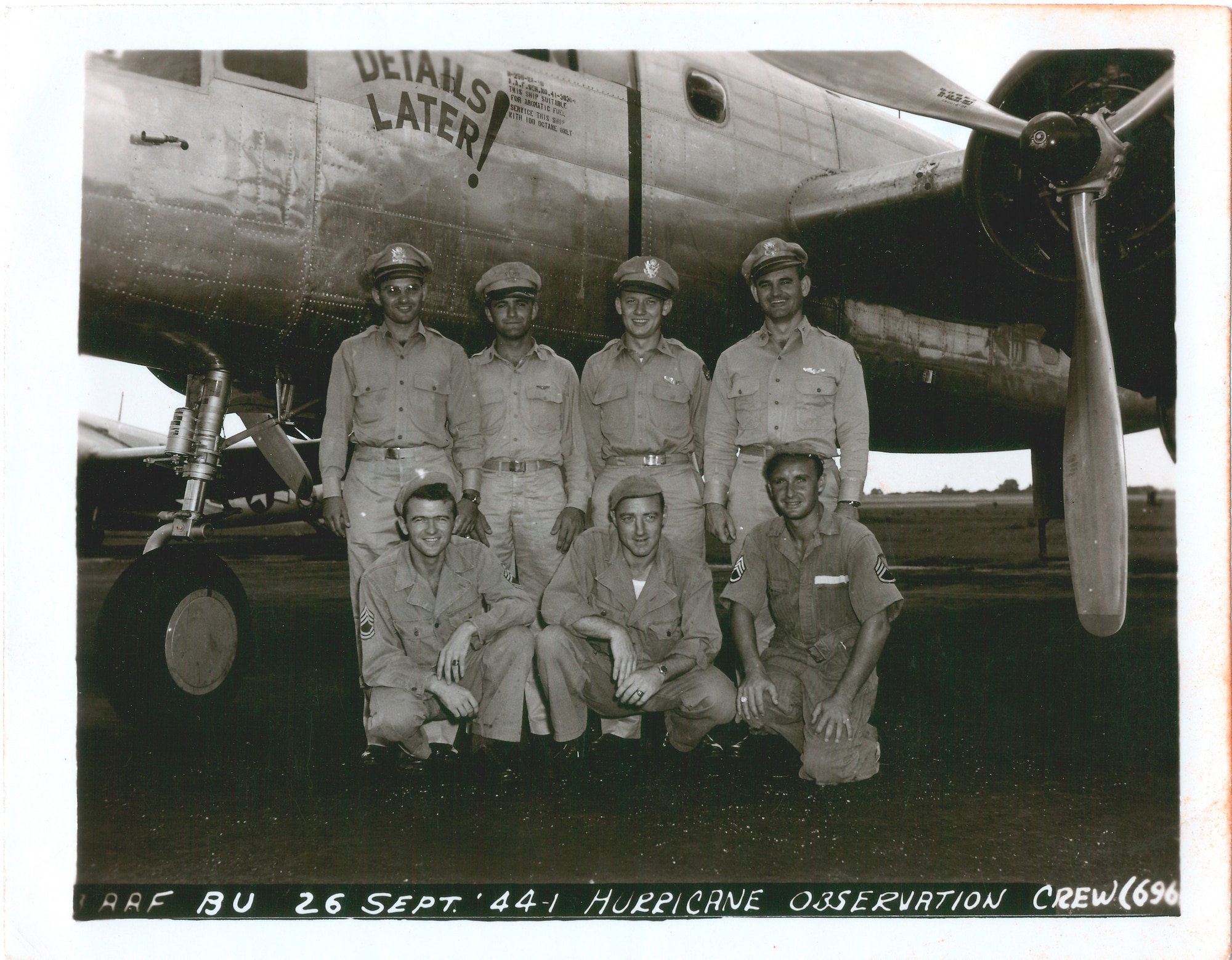 Crew of Details Later!, one of the two B-25s of the Hurricane Reconnaissance Unit at Morrison Field. Capt. Allen C. Wiggins, pilot, is at the end right, back row, and Capt. Billy B. Boothe, navigator, second from the left on the back row. The aircrew consisted of a pilot, co-pilot, navigator, meterologist, radio operator, engineer, and crew chief. (Official U.S. Army Air Force photo)