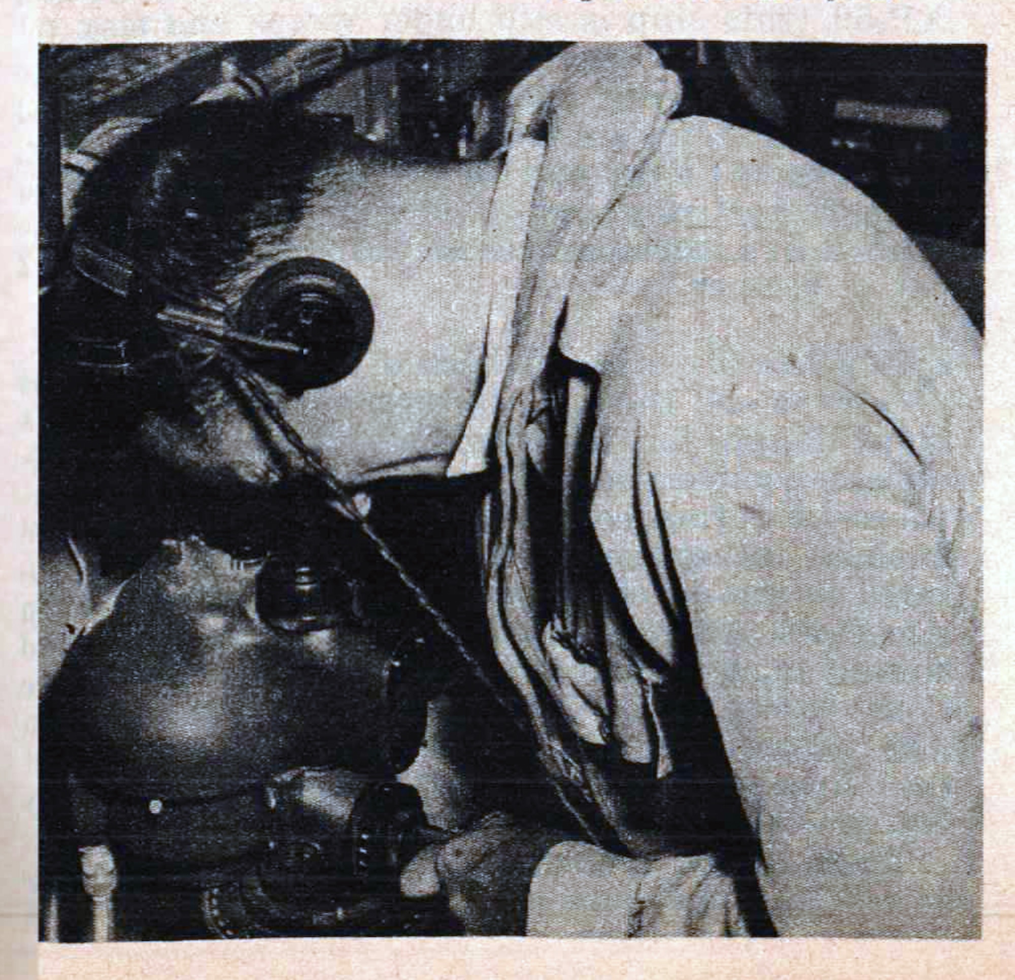 Capt. Billy B. Boothe, navigator of the Details Later!, takes a drift reading on the drift meter to find whether the storm is driving on course. The aircrew on the B-25 Hurricane Reconnaissance Unit aircraft consisted of a pilot, co-pilot, navigator, meterologist, radio operator, engineer, and crew chief. (Official U.S. Army Air Force photo)