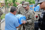 Puerto Rico Army National Guard soldiers continue their efforts of distributing much-needed supplies to communities around the Island in the aftermath of Hurricane Maria in Cidra, Puerto Rico, Nov 27, 2017. Water was delivered to a nursing home for elderly Alzheimer patients.