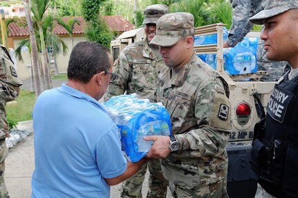 Puerto Rico Army National Guard soldiers continue their efforts of distributing much-needed supplies to communities around the Island in the aftermath of Hurricane Maria in Cidra, Puerto Rico, Nov 27, 2017.