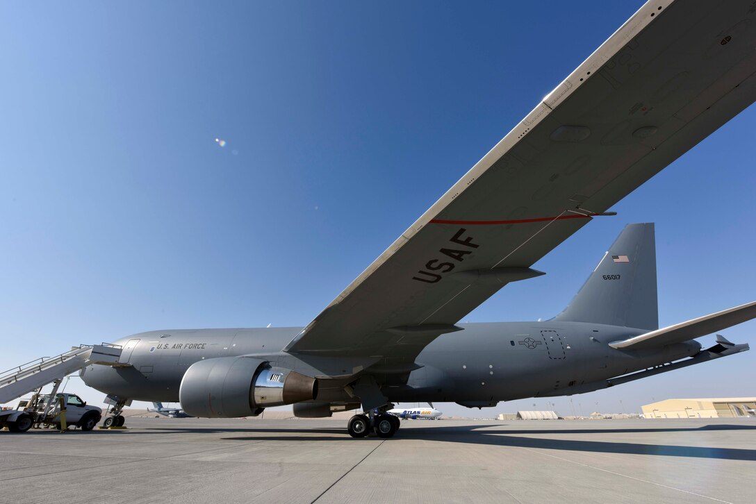A KC-46 Pegasus sits on the flightline at Al Udeid Air Base, Qatar on Nov. 22, 2019. The KC-46 is an aerial refueling and transport aircraft designed to replace the KC-135 Stratotanker. (U.S. Air Force Photo by Tech. Sgt. John Wilkes)
