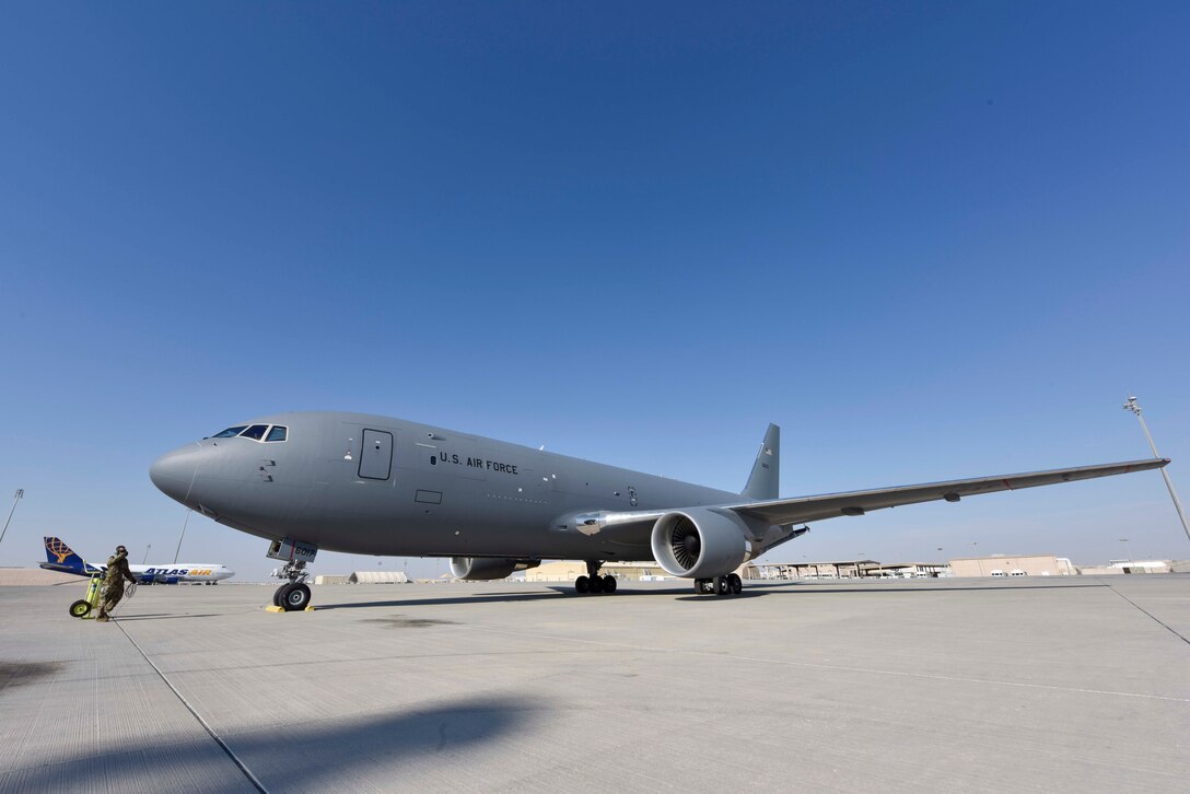 A KC-46 Pegasus sits on the flightline at Al Udeid Air Base, Qatar on Nov. 22, 2019. The KC-46 is an aerial refueling and transport aircraft designed to replace the KC-135 Stratotanker. (U.S. Air Force Photo by Tech. Sgt. John Wilkes)