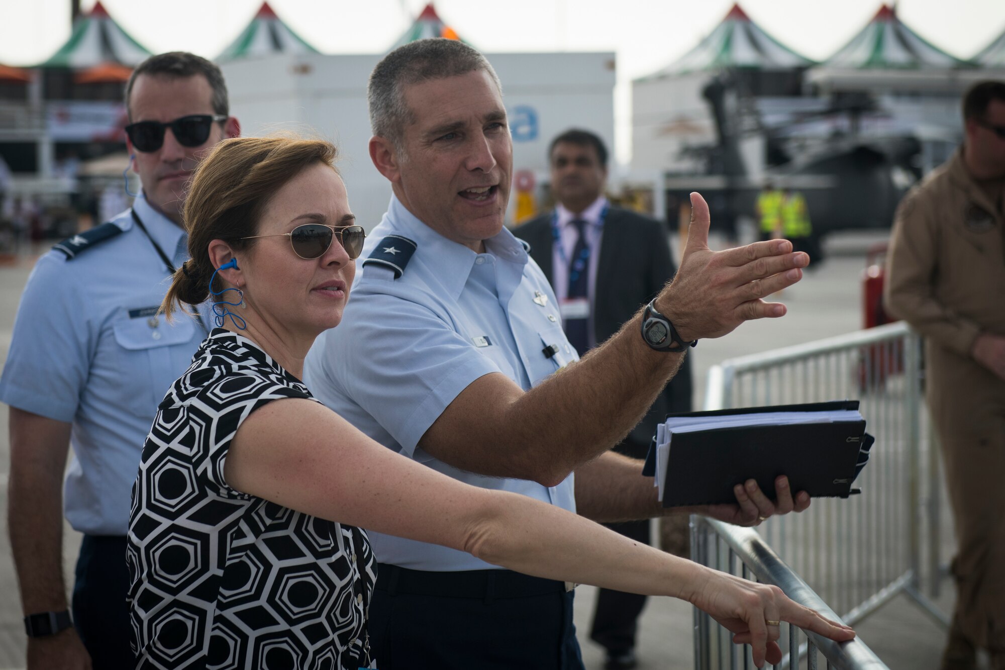 U.S. Air Force Brig. Gen. Matthew Isler, center, the Director of Regional Affairs for the Deputy Under Secretary of the Air Force, International Affairs, briefs Kelli Seybolt, center, the Deputy Under Secretary of the Air Force, International Affairs, on U.S. military aircraft capabilities at the Dubai Airshow, United Arab Emirates, on Nov. 18, 2019.