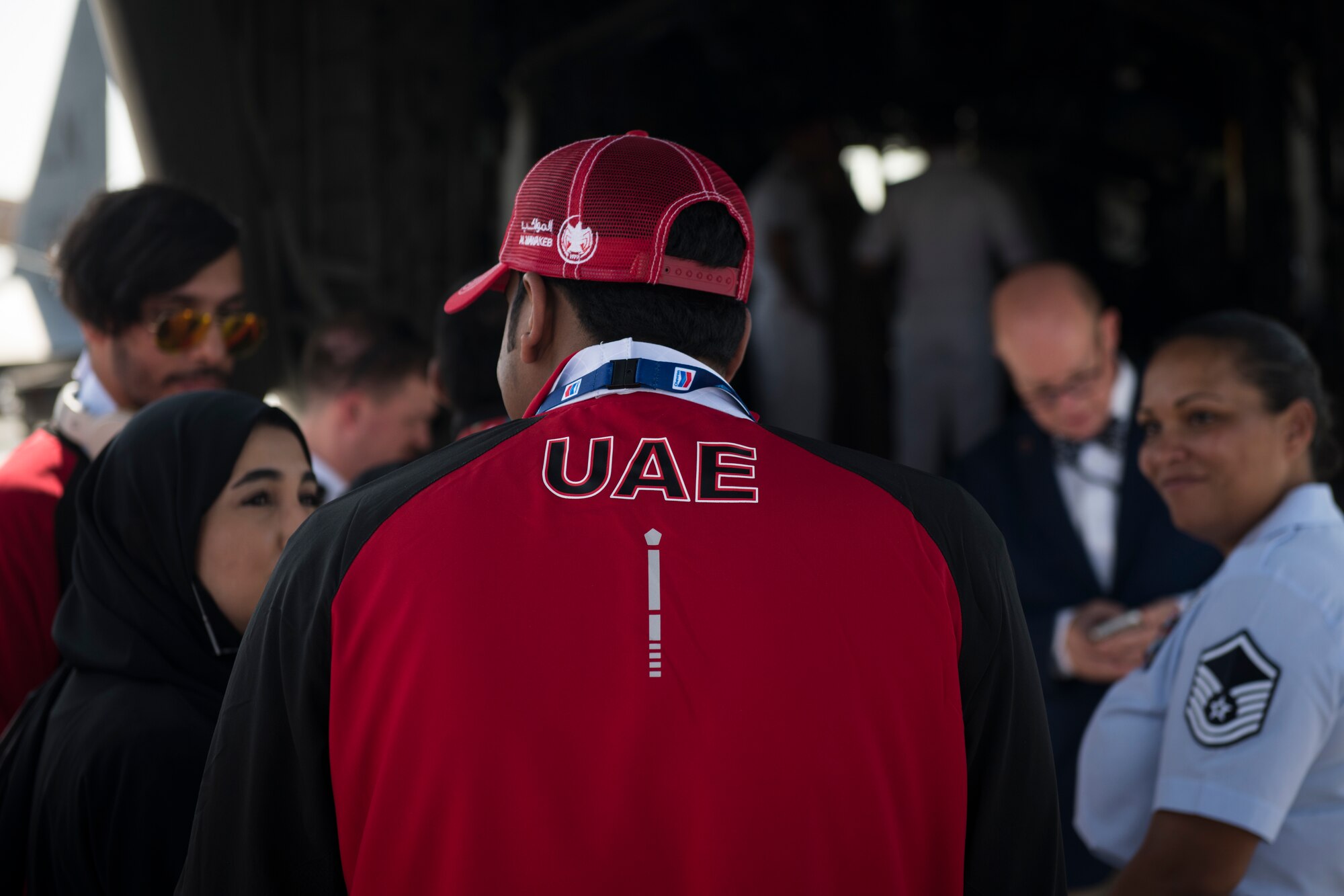 A member of the United Arab Emirates Special Olympics team tours a U.S. Navy MH-53E Sea Dragon at the Dubai Airshow, United Arab Emirates, Nov. 18, 2019.