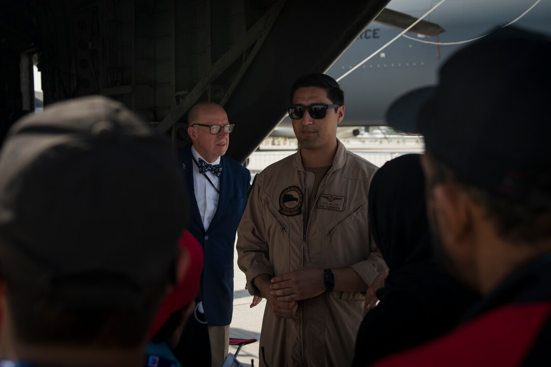 U.S. Navy AWS2 (NAC/AW) Jose Soria Avila, an MH-53E Sea Dragon crew chief with the Helicopter Mine Countermeasures Squadron 15 (HM-15), briefs the United Arab Emirates Special Olympics team at the Dubai Airshow, United Arab Emirates, Nov. 18, 2019.