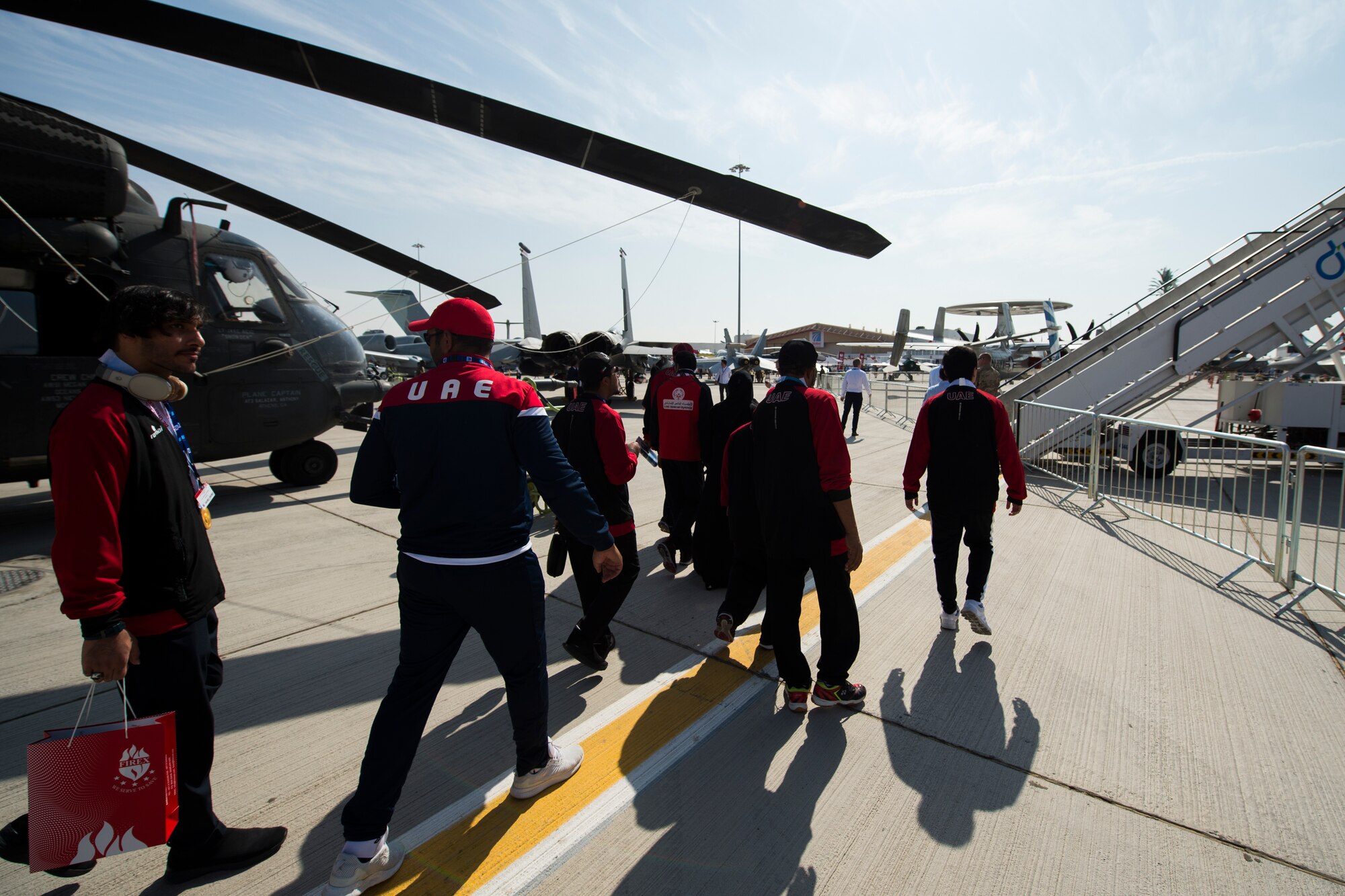 Members of the United Arab Emirates Special Olympics team tour U.S. military aircraft at the Dubai Airshow, United Arab Emirates, Nov. 18, 2019.