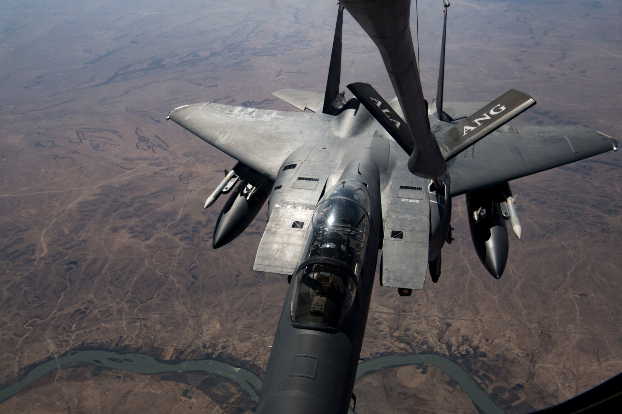 A U.S. Air Force KC-135 Stratotanker refuels A U.S. Air Force F-15 Strike Eagle over northern Iraq, Nov. 20, 2019.