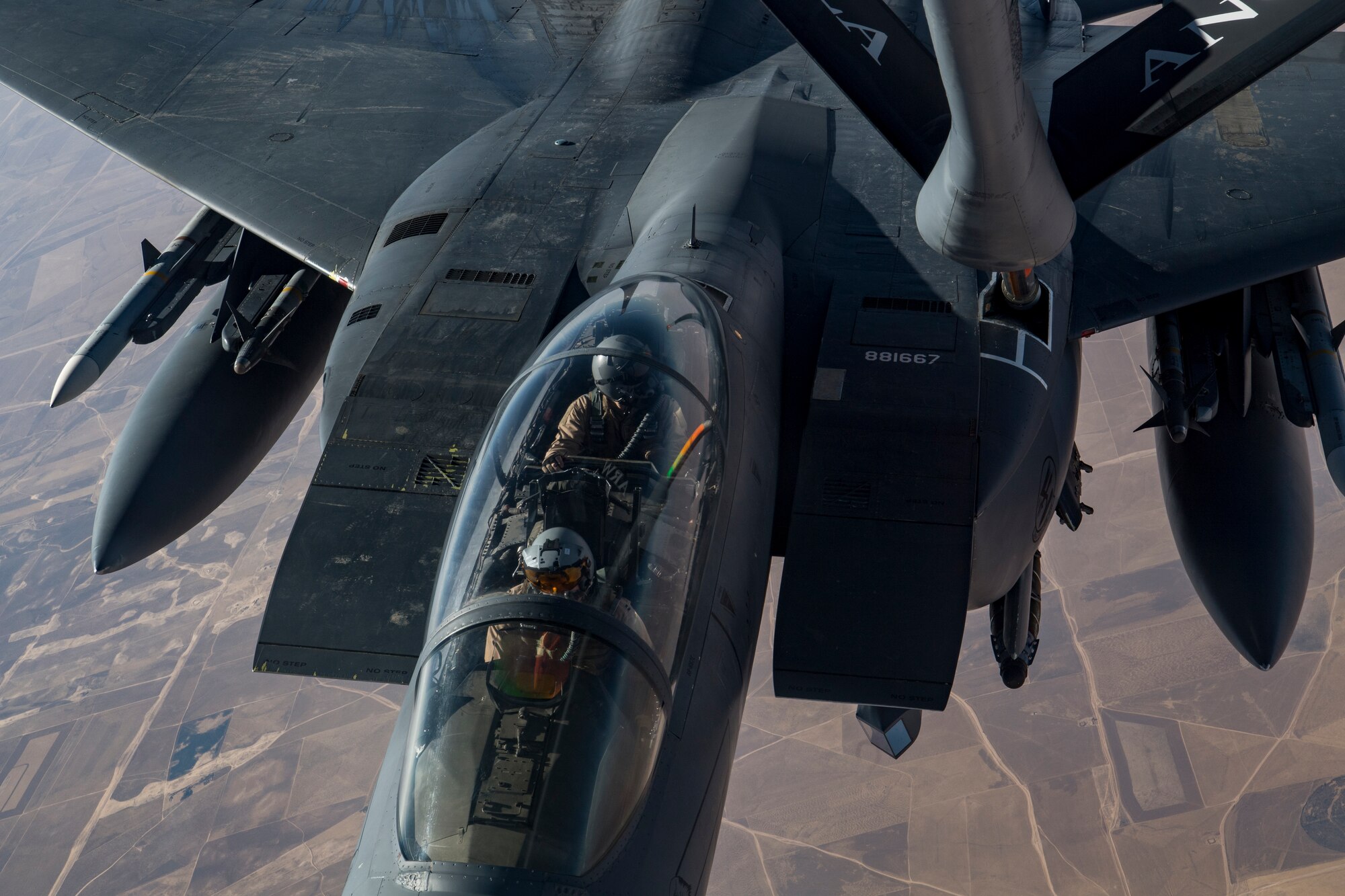A U.S. Air Force KC-135 Stratotanker refuels A U.S. Air Force F-15 Strike Eagle over northern Iraq, Nov. 20, 2019.
