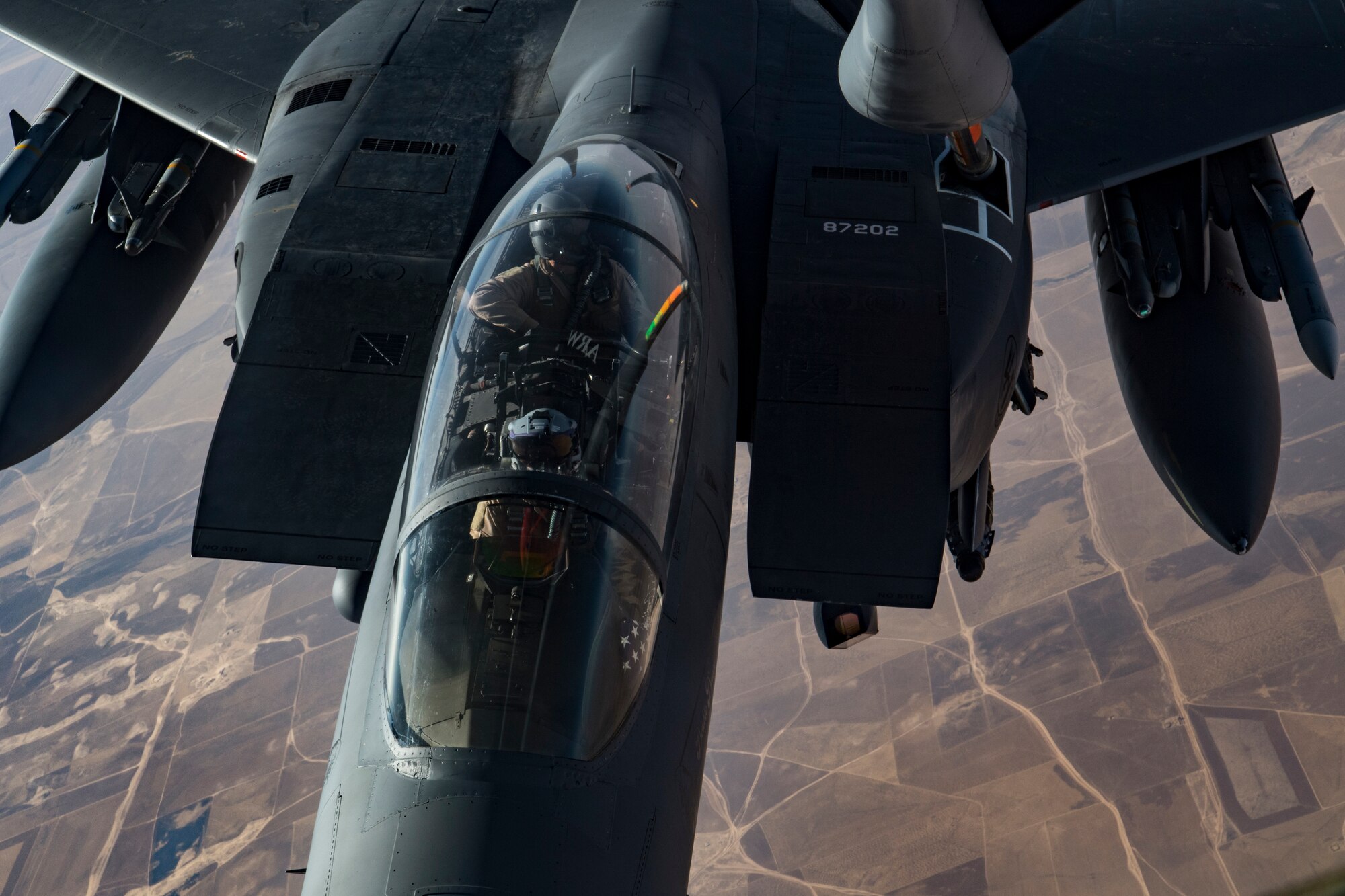 A U.S. Air Force KC-135 Stratotanker refuels A U.S. Air Force F-15 Strike Eagle over northern Iraq, Nov. 20, 2019.