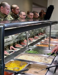 Military leaders from the 37th Training Wing donned aprons and chef hats to help serve Thanksgiving dinner to Airmen in Basic Military Training at Joint Base San Antonio-Lackland Nov. 28.