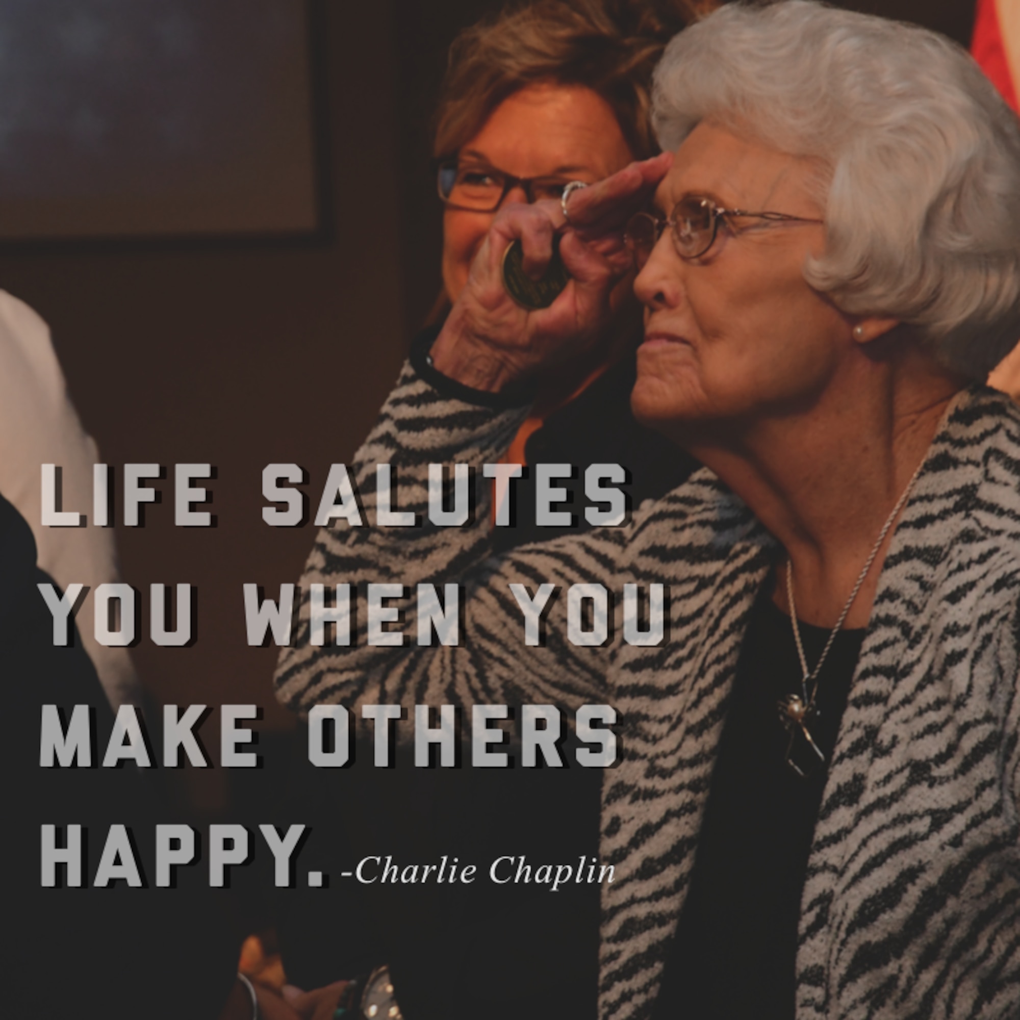 This week's motivation is courtesy of comedic actor, Charlie Chaplin, who said, "Life salutes you when you make others happy." (U.S. Air Force graphic/Tech. Sgt. Andrew Park)