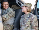 Pvt. 1st Class Jon Solano, an infantryman assigned to Bravo Company, 2nd Infantry Battalion, 4th Infantry Regiment, 3rd Brigade Combat Team, 10th Mountain Division, gives Lt. Gen. Laura J. Richardson, Commanding General, U.S. Army North, a demonstration on the operation of the mobile surveillance camera truck near Tucson, Arizona, Nov. 26, during a visit to service members working along the U.S. southern border.