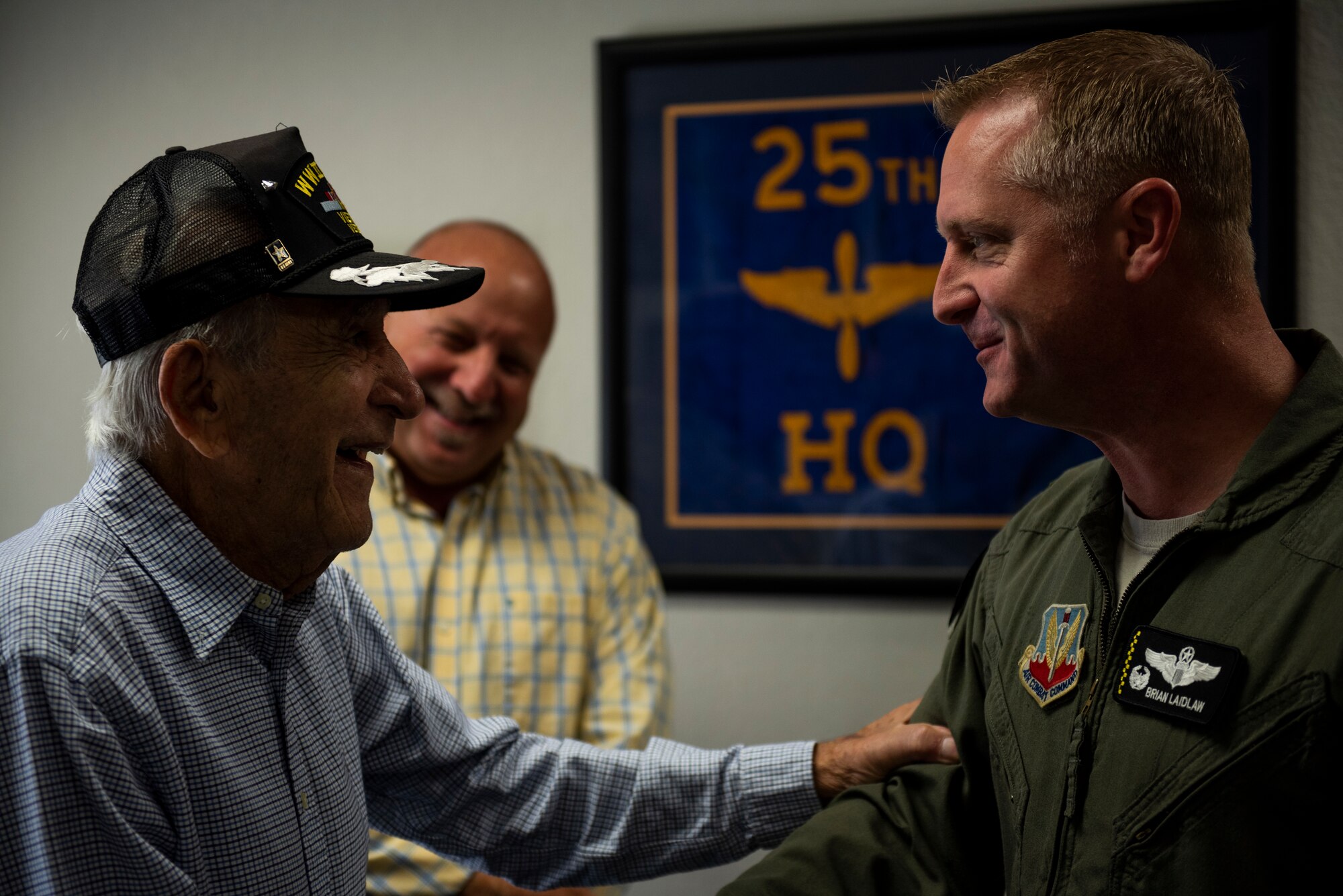 Retired U.S. Air Force Lt. Col. Daniel Daube, left, Thomas Bonifay, 325th Fighter Wing public affairs community relations liaison, center, speak to U.S. Air Force Col. Brian Laidlaw, 325th Fighter Wing commander, right, at Tyndall Air Force Base, Florida, Nov. 27, 2019. Daube, a veteran of World War II, Korean, and Vietnam war, visited Tyndall Air Force Base and toured multiple facilities. (U.S. Air Force photo by Staff Sgt. Magen M. Reeves)