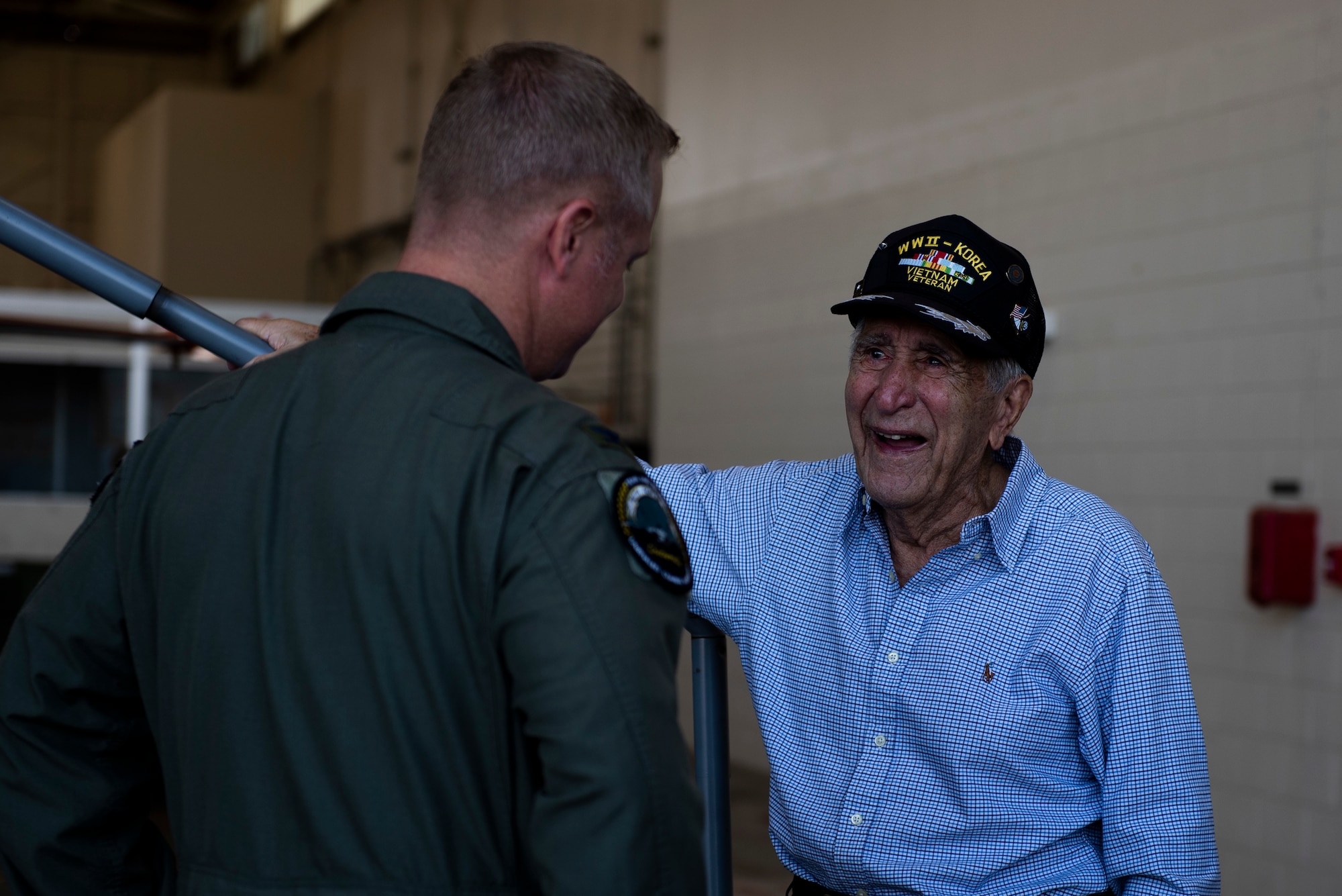 U.S. Air Force Col. Brian Laidlaw, 325th Fighter Wing commander, left, speaks to Retired U.S. Air Force Lt. Col. Daniel Daube, right, at Tyndall Air Force Base, Florida, Nov. 27, 2019. Daube was a veteran of World War II, Korean, and Vietnam war, flying multiple air frames and combat missions. Daube visited Tyndall's air traffic control tower, saw planes launch off the runway, and visited a QF-16 Fighting Falcon hangar and sat in the cockpit of an aircraft. (U.S. Air Force photo by Staff Sgt. Magen M. Reeves)