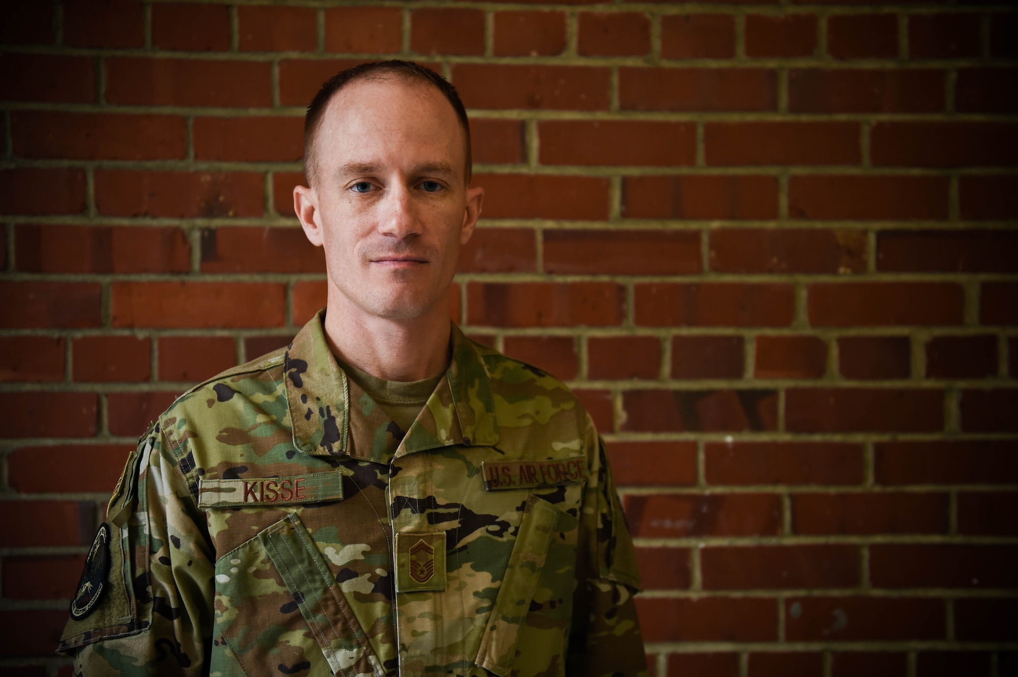 Senior Master Sgt. Christopher Kisse, 361st Recruiting Squadron superintendent, poses for a photo on Joint Base Lewis-McChord, Wash., Nov. 26, 2019. He was one of the nine McChord Airmen selected this year for promotion to chief master sergeant, the highest enlisted rank in the Air Force.

“Making chief master sergeant is a direct reflection of teachable moments molding me over the course of this journey. I am humbled to have been selected to join the Chief ranks and am blessed to have the opportunity to pay forward the leadership my chief mentors provided to me throughout my career. 
There is no such thing as a leadership style. We have unique and individual Airmen that make up our force. It’s our responsibility to adapt to that uniqueness, align the strengths and goals of those individuals with the mission, and champion a loyal and dedicated team.
Chief master sergeant is not a rank you achieve on your own. I’m forever grateful countless teammates that I’ve worked alongside over years. I’m only on this list because of their efforts, faith and fortitude. Even more so, I’m indebted to my wife and children, they are the ones that truly sacrificed over the years, and my service is their service.”

(U.S. Air Force photo by Airman 1st Class Mikayla Heineck)