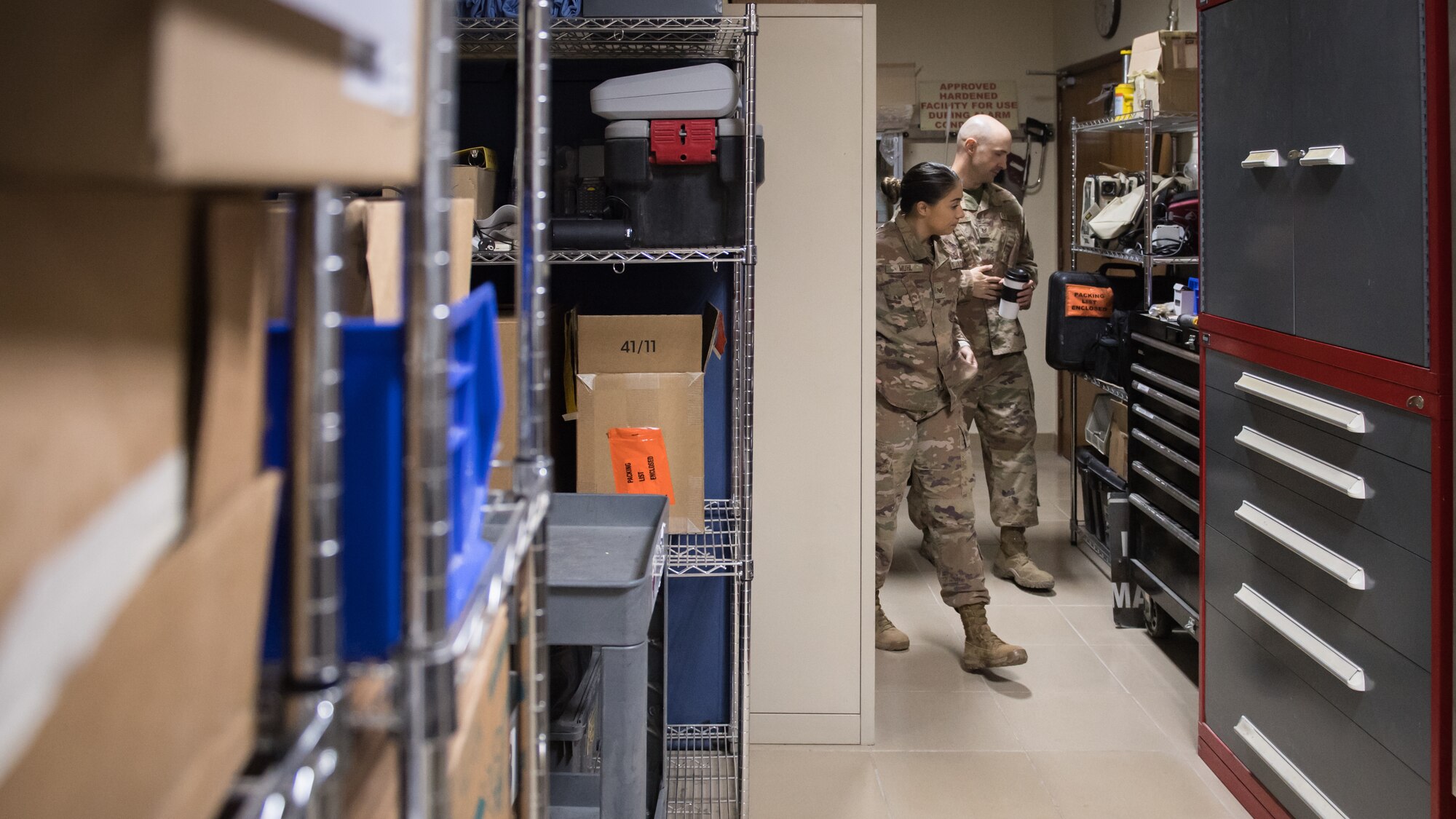 U.S. Air Force Staff Sgt. Courtney Muhl, 386th Air Expeditionary Wing occupational safety NCO-in-charge, performs a safety inspection inside the base clinic with Tech. Sgt. Joshua Henderson, 386th Expeditionary Medical Group biomedical engineering technician and medical facility manager, at Ali Al Salem Air Base, Kuwait, Nov. 27, 2019. Muhl conducted an annual safety inspection of the clinic ensuring it complied with safety requirements, standards and programs. (U.S. Air Force photo by Tech. Sgt. Daniel Martinez)