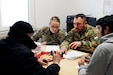 U.S. Army Sgt. Caitlin Thompson, 457th Civil Affairs Battalion, 361st Civil Affairs Brigade, works alongside Hungarian Army Zászlós Ferenc Kapor during Joint Cooperation 2019, an annual civil-military cooperation exercise, involving 24 nations from Europe and North America, Nov. 7, 2019 in Steyerberg, Germany.



The exercise included approximately 500 Soldiers and civilians.



During the exercise, the Soldiers are placed in a scenario of conflict in the fictional states of Torrike and Framland. The Soldiers mission is to interact with roleplayers acting as local citizens of the area who either question military presence in the area, want to provide information or need help addressing humanitarian concerns. The exercise was conducted from Oct. 28 - Nov. 8 in and around Nienberg, Germany. (U.S. Army photo by Capt. Doug Magill, 7th Mission Support Command)