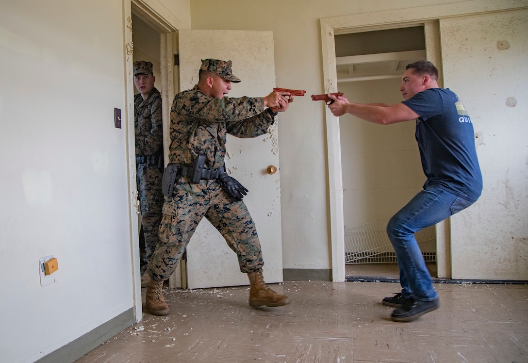 U.S. Marines participate in an active shooter training, Camp Foster, Okinawa, Japan, Nov. 26, 2019. Marines with PMO conducted the training to ensure readiness and reliability in the event of an active shooter.