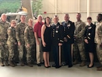 Warrant Officer Brian Sexton (center), Georgia Army National Guard systems integration branch chief, helped the GAARNG migrate from the Standard Installation and Division Personnel Reporting System to the Integrated Personnel and Pay System-Army. Sexton is excited Soldiers now have some control over completing Human Resource tasks.