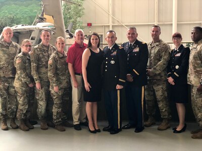 Warrant Officer Brian Sexton (center), Georgia Army National Guard systems integration branch chief, helped the GAARNG migrate from the Standard Installation and Division Personnel Reporting System to the Integrated Personnel and Pay System-Army. Sexton is excited Soldiers now have some control over completing Human Resource tasks.