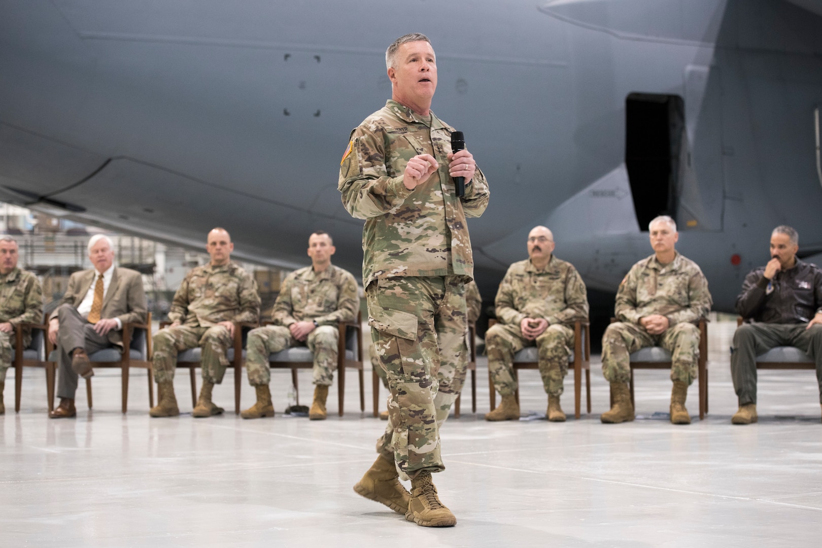 Maj. Gen. James Hoyer, Adjutant General of the West Virginia National Guard, speaks to Soldiers and family members of the 157th Military Police Company during a deployment ceremony held Dec. 3, 2019, at the 167th Airlift Wing in Martinsburg, W.Va. More than 160 Soldiers will be deploying to Guantanamo Bay for nearly a year to support U.S. Southern Command’s high-risk detention operations. (U.S. Air National Guard photo by Senior Master Sgt. Emily Beightol-Deyerle)