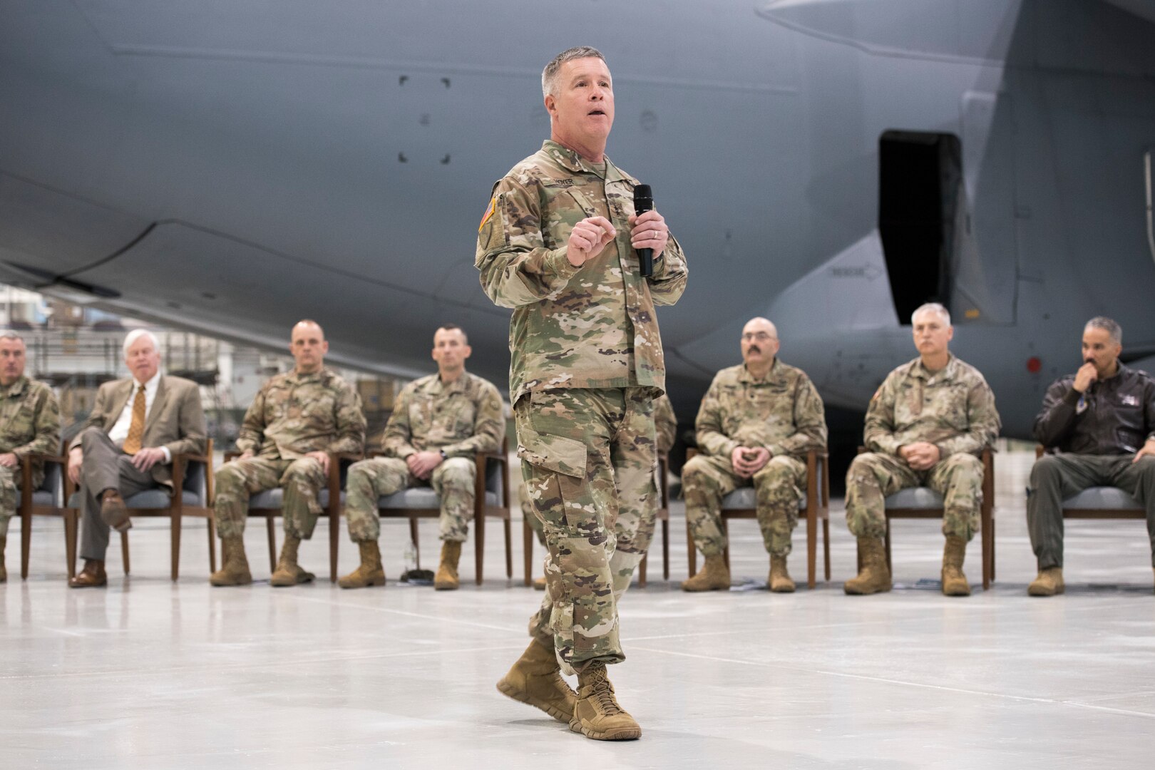 Maj. Gen. James Hoyer, Adjutant General of the West Virginia National Guard, speaks to Soldiers and family members of the 157th Military Police Company during a deployment ceremony held Dec. 3, 2019, at the 167th Airlift Wing in Martinsburg, W.Va. More than 160 Soldiers will be deploying to Guantanamo Bay for nearly a year to support U.S. Southern Command’s high-risk detention operations. (U.S. Air National Guard photo by Senior Master Sgt. Emily Beightol-Deyerle)