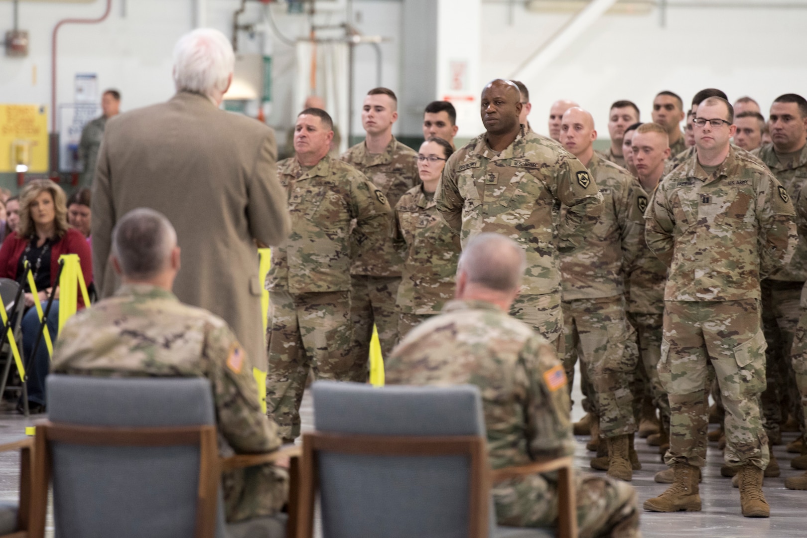 Mike Hall, Chief of Staff for Governor Jim Justice, addresses Soldiers of the 157th Military Police Company during a deployment ceremony held Dec. 3, 2019, at the 167th Airlift Wing in Martinsburg, W.Va. More than 160 Soldiers will be deploying to Guantanamo Bay for nearly a year to support U.S. Southern Command’s high-risk detention operations. (U.S. Air National Guard photo by Senior Master Sgt. Emily Beightol-Deyerle)