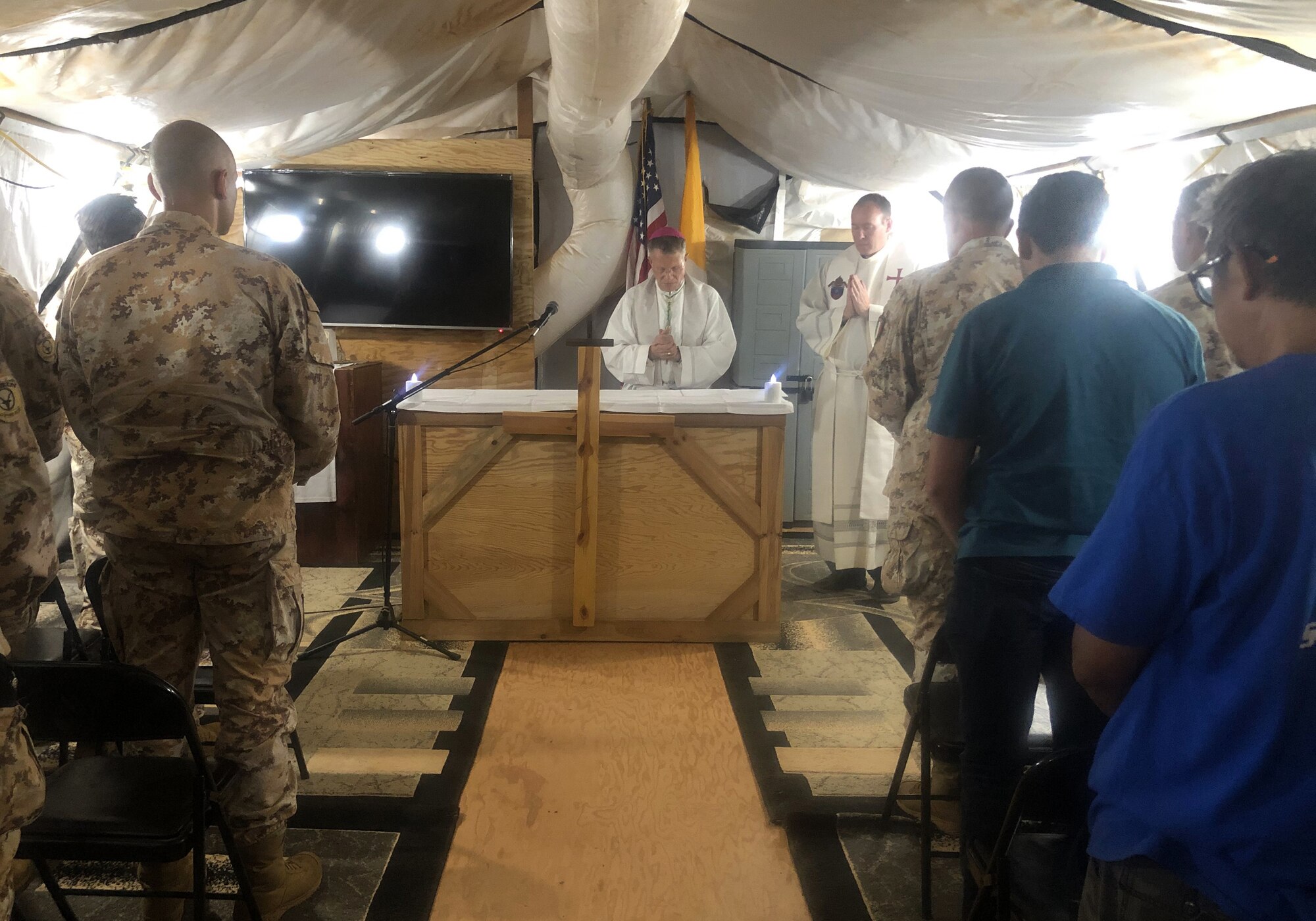 Archbishop Timothy Broglio, Archbishop of U.S. Military Services, celebrates Mass with U.S. and Italian service members deployed to Nigerien Air Base 101 in Niamey, Niger, Nov. 3, 2019. While at the airbase, the archbishop also blessed a monument in honor of fallen Italian soldiers for the Italian Armed Forces’ 100th anniversary. (Courtesy Photo)