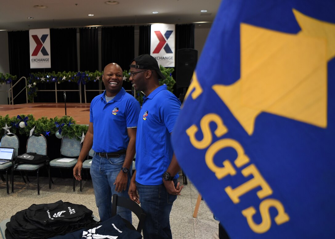 U.S. Air Force Master Sgt. Brad Johnson, 86th Civil Engineer Squadron first sergeant, and Master Sgt. Ato Ellis, 435th Air Expeditionary Wing, Security Forces Squadron and Wing Staff Agencies first sergeant, hand out prizes during the Angel Tree
Kickoff at Ramstein Air Base, Germany, Dec. 1, 2019. The Angel Tree Program is active until Dec. 31, 2019. (U.S. Air Force photo by Staff Sgt. Kirby Turbak)
