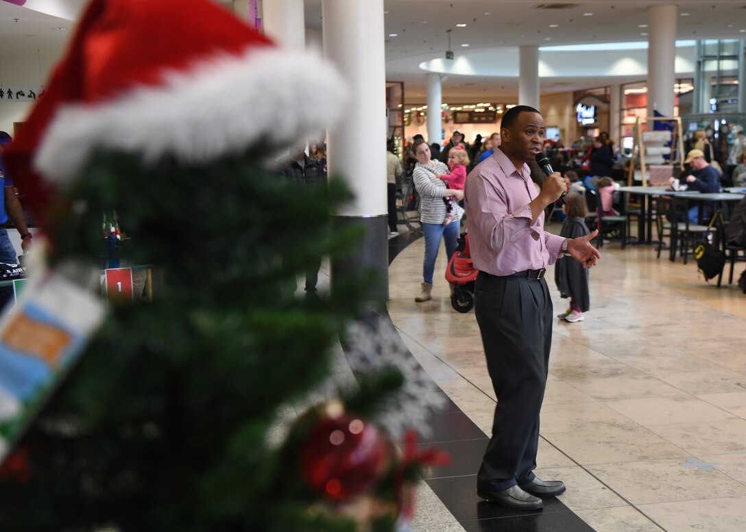 U.S. Air Force Chief Master Sgt. Terrance Smiley, Kisling Noncommissioned Officer Academy commandant, speaks during the Angel Tree Kickoff at Ramstein Air Base, Germany, Dec. 1, 2019. Smiley spoke about the importance of giving back during the holiday season and how it affected him in the past. (U.S. Air Force photo by Staff Sgt. Kirby Turbak)