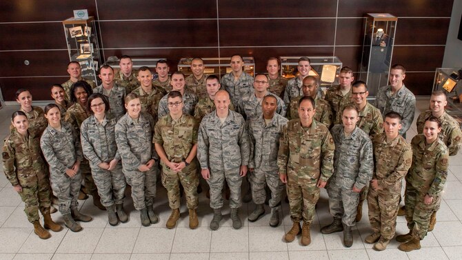 Air Force Space Command Deputy Commander Maj. Gen. John Shaw (front row, fourth from right) welcomes participants of AFSPC’s first-ever Direct Ascent Program at Peterson Air Force Base, Colorado, Oct. 16, 2019. This program is created to develop today’s mid-level officer and enlisted leaders on the criticality of space capabilities to the multi-service, multi-domain battle and need to ensure freedom of action in space, while denying potential adversaries the same. (U.S. Air Force photo by Dave Grim)