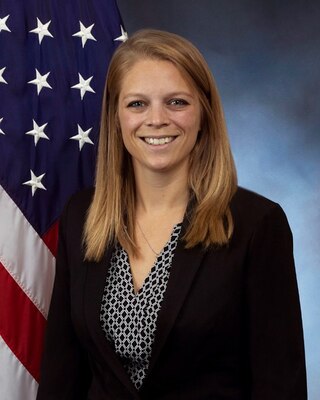 Leann Gaviglio official photo with American flag in background