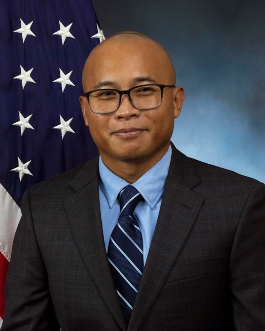 official photo with blue background and American flag