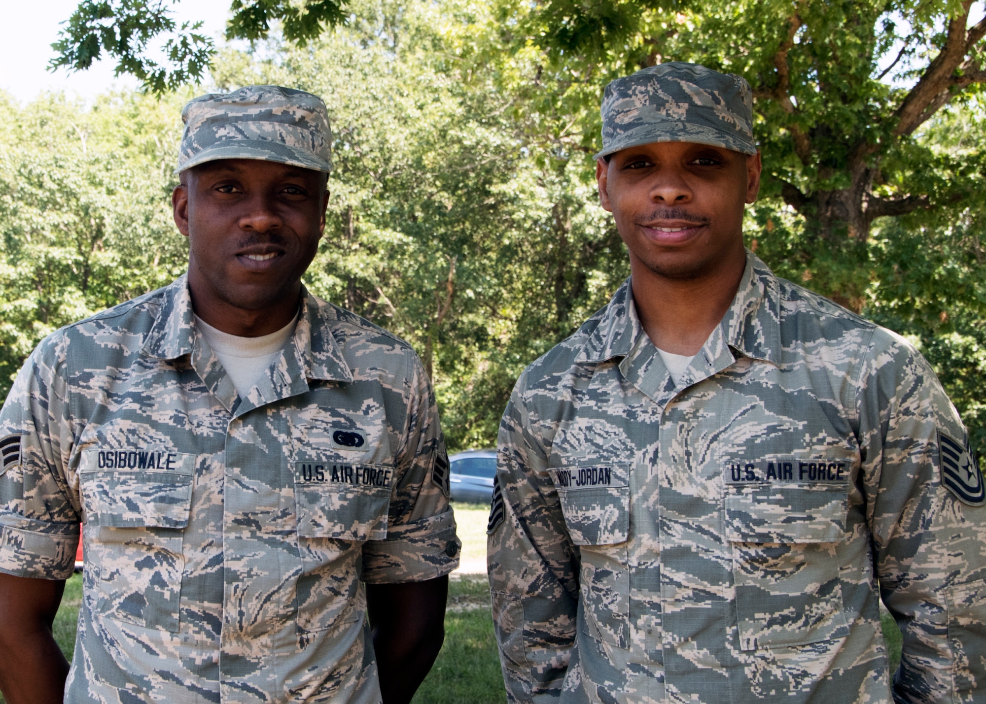 Senior Airman Adetokunbo Osibowale (left) and Tech Sgt. Kyle Waddy-Jordan, 459th Logistics Readiness Squadron, pose for a photo Sept 3, 2019 at Joint Base Andrews, Md. Waddy-Jordan recently saved Osibowale’s life during training to Okinawa Air Base, Japan.