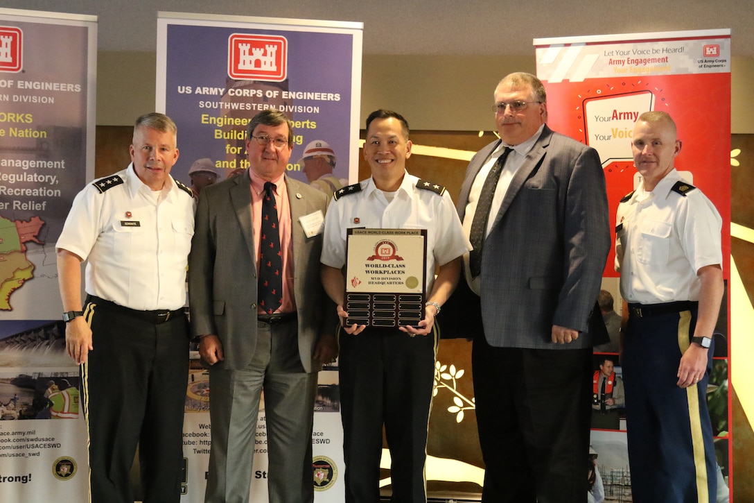 During the U.S. Army Corps of Engineers Executive Governance Meeting in Dallas, Texas, Nov. 18 - 20, 2019, Mississippi Valley Division was recognized as a World Class Organization - Best Place to Work and received the #1 Major Subordinate Command award.  Lt. Gen. Todd T. Semonite, (left) USACE Commanding General and 54th U.S. Army Chief of Engineers and USACE Command Sgt. Maj. Bradley Houston (right) presented the award to Mr. Tom Holden, MVD Director of Regional Business Directorate, Maj. Gen. Mark Toy, MVD Commanding General, and Mr. Jim Bodron, MVD Director of Programs Directorate.