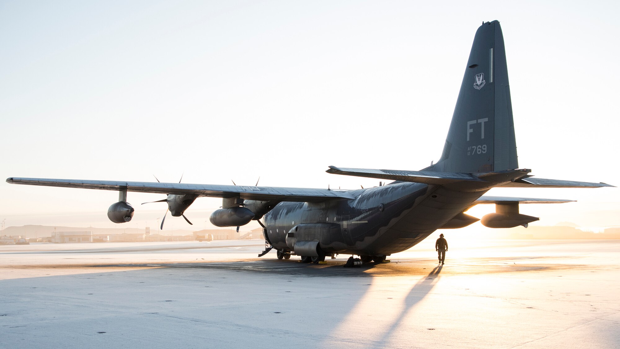 Photo of a military aircraft carrier parked on a flightline in Iceland.