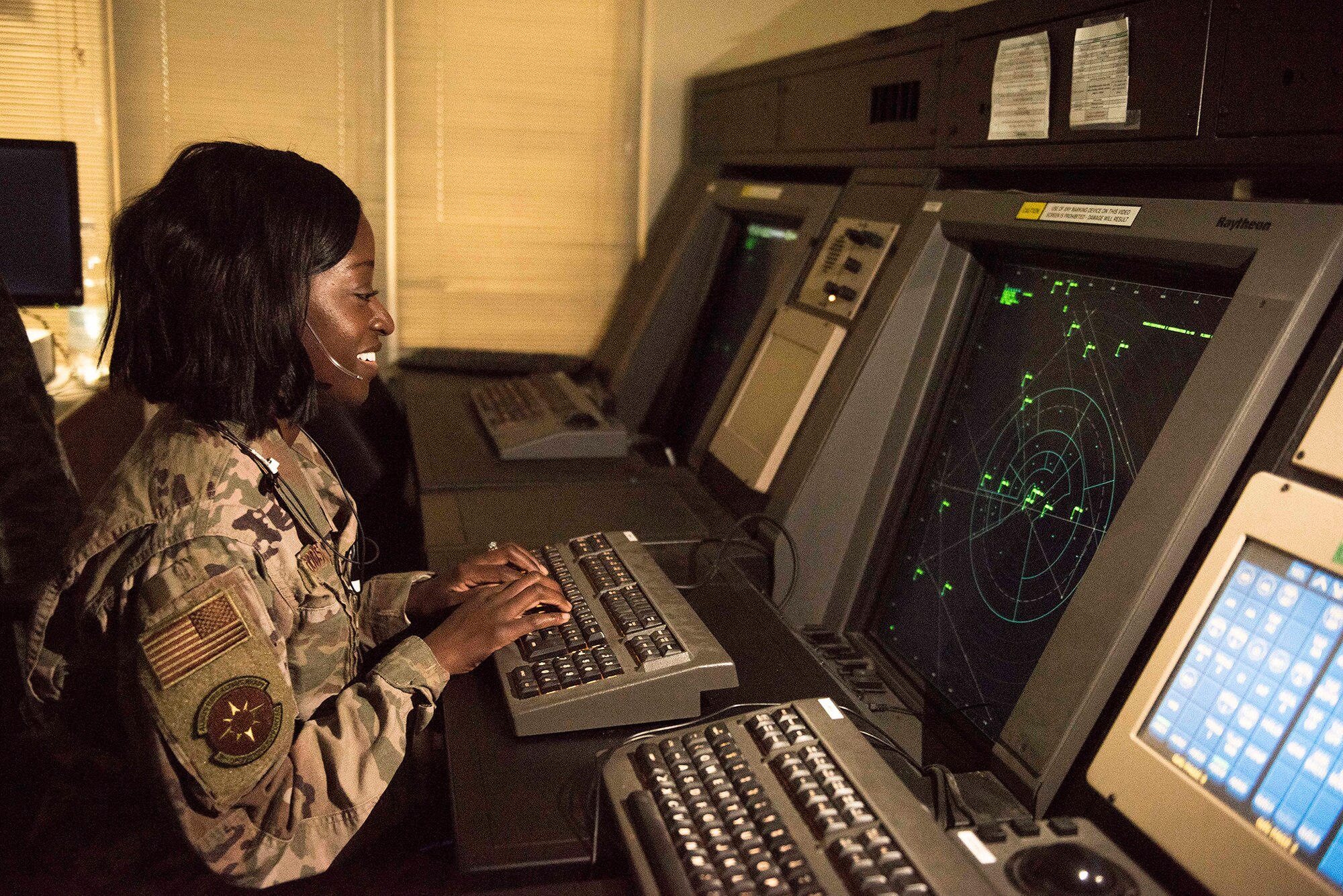 U.S. Air Force Staff Sgt. Keona Woods, 39th Operations Support Squadron radar approach and control watch supervisor, monitors the surrounding airspace Nov. 25, 2019, at Incirlik Air Base, Turkey. Air Force RAPCON facilities conduct 24/7 surveillance of their airspaces to ensure safe air traffic within their respective areas of responsibility. (U.S. Air Force photo by Staff Sgt. Joshua Magbanua)