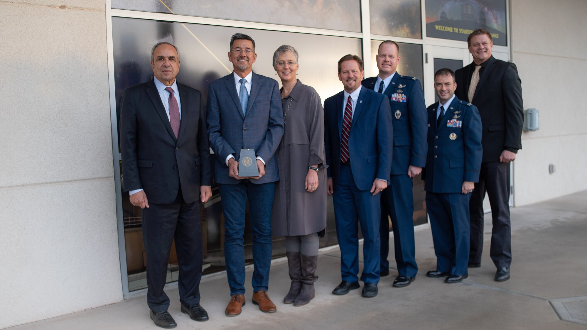 Left to Right: Dr. Richard Joseph Chief Scientist of the Air Force; Dr. Robert Johnson 2018 Harold Brown Award winner; Dr. Bethany Kolb wife of Dr. Johnson; Dr. Kelly Hammett AFRL Directed Energy director; Col. Joseph Roth AFRL Space Electro-Optics division chief; Col. Mario Serna Military Assistant to the Air Force Chief Scientist; and Dr. Darrell Lochtefeld Special Assistant to the Air Force Chief Scientist following the awards ceremony on Nov. 21, 2019. (U.S. Air Force photo/ Macee Hunt)