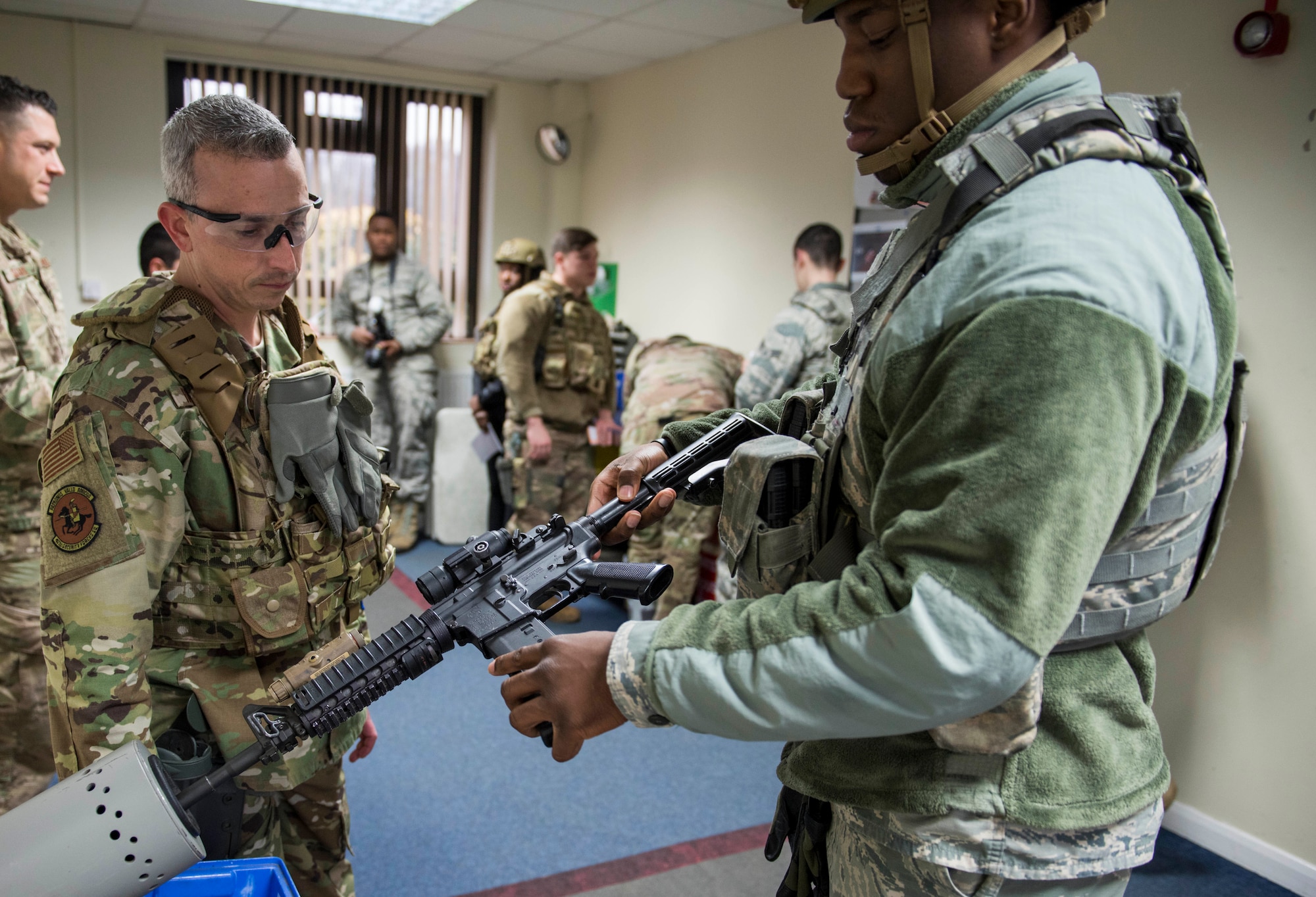 U.S. Air Force Airman 1st Class Cameron Rogers, 422nd Security Forces Squadron installation entry controller, clears an M4 carbine during a recall exercise at RAF Croughton, England, November 21, 2019. Quarterly recall exercises are a form of readiness for defenders to always be prepared to respond at a moment’s notice. (U.S. Air Force photo by Airman 1st Class Jennifer Zima)